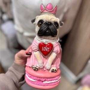 Pink and Red pug Dog Figurine with Crown sitting on macaroon